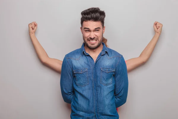 Young man making a funny face — Stock Photo, Image