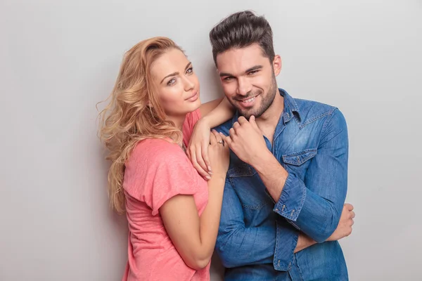 Gorgeous young woman leaning on her lover — Stock Photo, Image