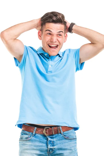 Happy casual man laughing away from the camera — Stock fotografie