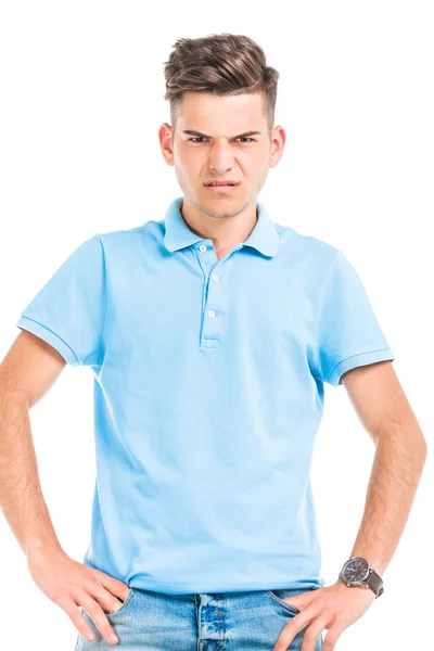 Angry young man looking at the camera — Stockfoto