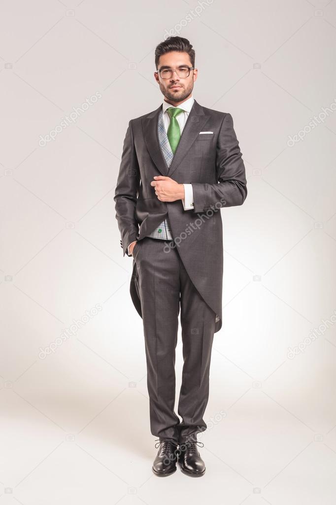 elegant young business man standing