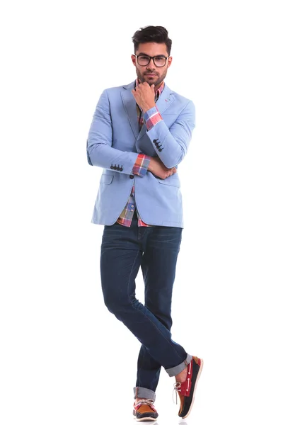 Handsome young man standing on studio background l — Stock Photo, Image
