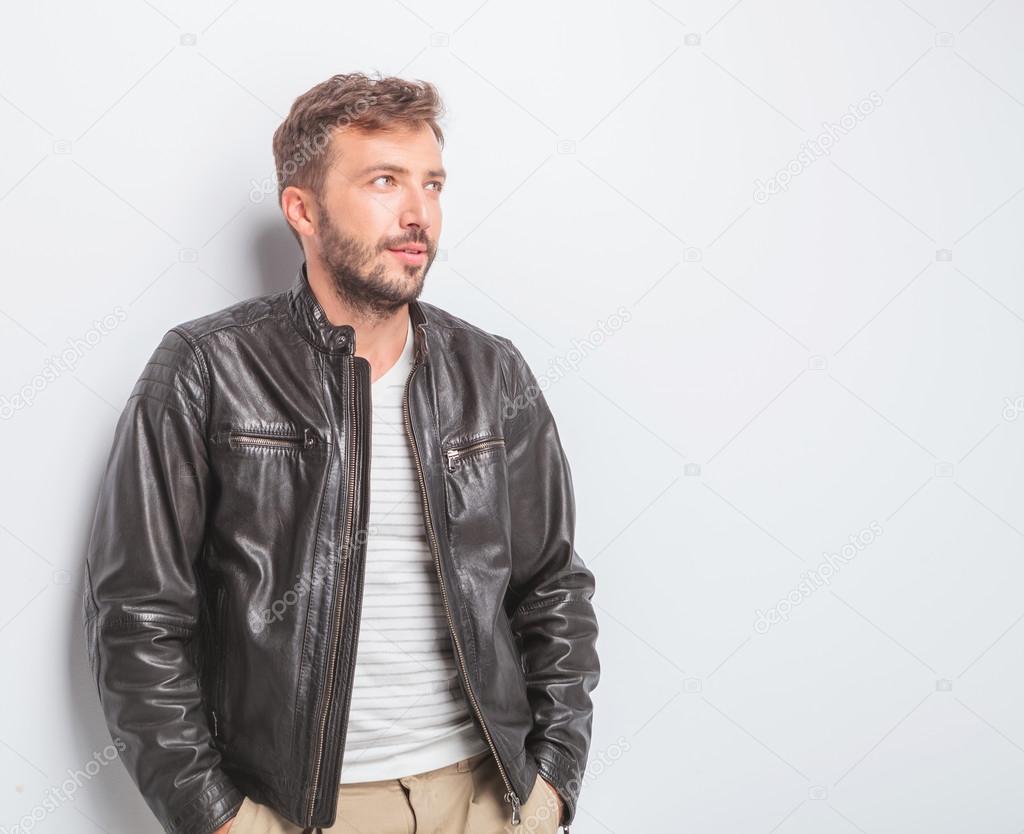 side view of a young casual man looking away