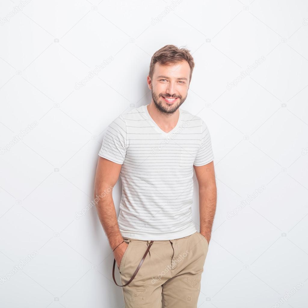 happy young casual man with big smile