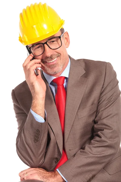 Happy senior architect talking on the phone — Stock Photo, Image