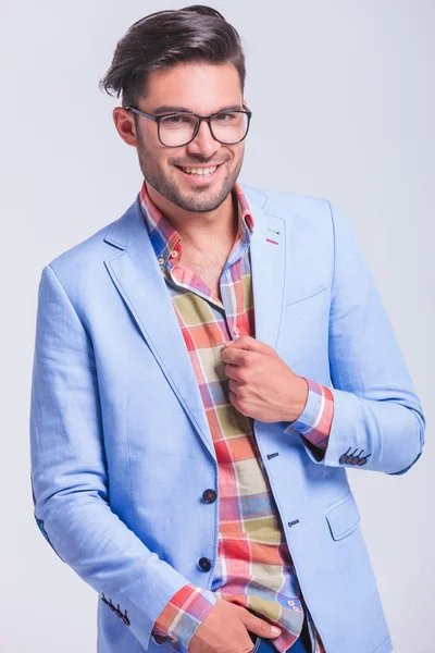 Attractive businessman posing with hand in pocket — Stok fotoğraf