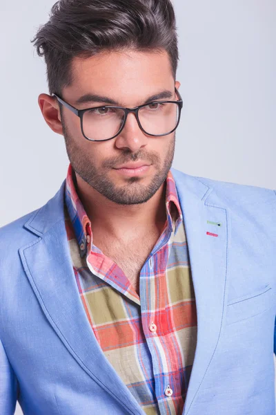 Close portrait of handsome smart casual man wearing glasses — Stockfoto