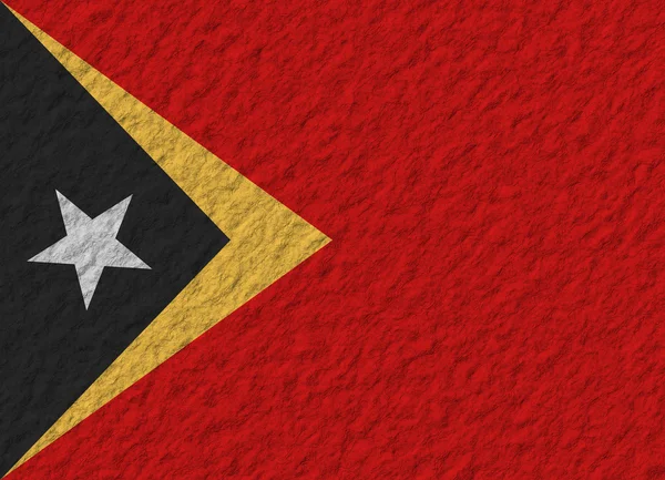 Timor Wschodni flaga kamień — Zdjęcie stockowe