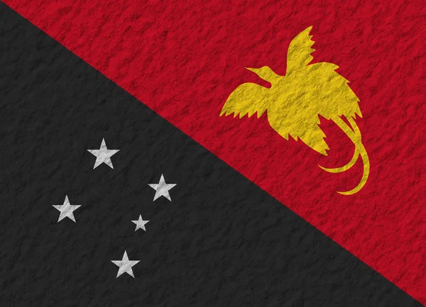 パプア ニューギニアの旗の石 — ストック写真
