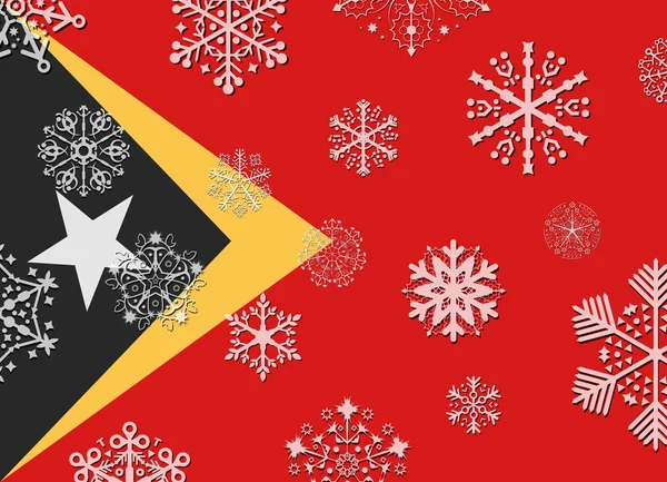 Östtimor flagga med snöflingor — Stock vektor