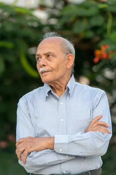 Senior Indian man looking away — Stock Photo, Image