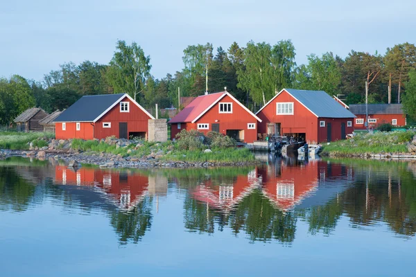 Fisherman cabins in sunset — Stock Photo, Image