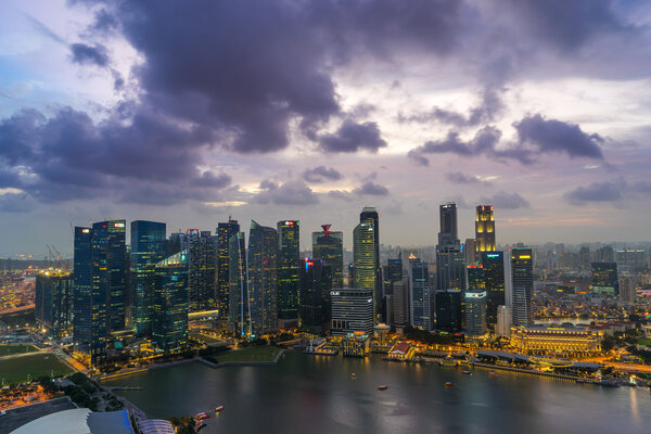 Singapore business district skyline after sun set at Marina Bay.