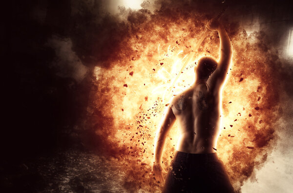 Man with katana sword over explosion background
