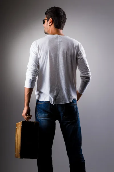 Ortrait of stylish confident man with vintage suitcase — Stock Photo, Image