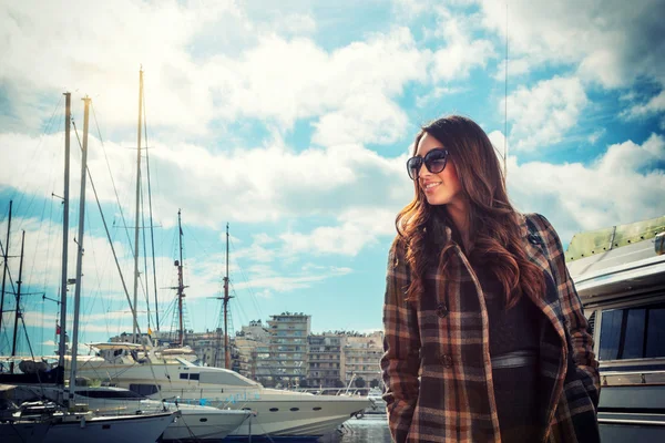 Young woman at the harbor — Stock Photo, Image