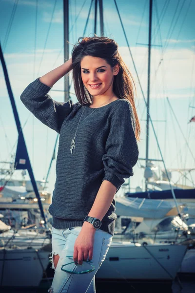 Young woman at the harbor — Stock Photo, Image