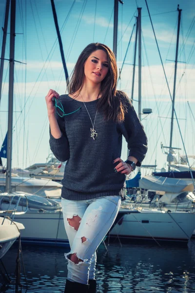 Young woman at the harbor — Stock Photo, Image