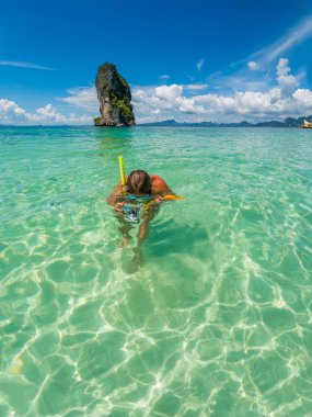 Beautiful woman snorkelling in Krabi Thailand clipart