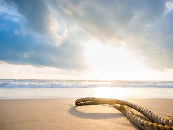 Old rope on the beach — Stock Photo, Image