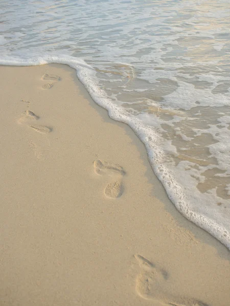 Voetafdrukken in het zand — Stockfoto