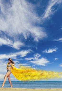 Bikinili genç kadın.