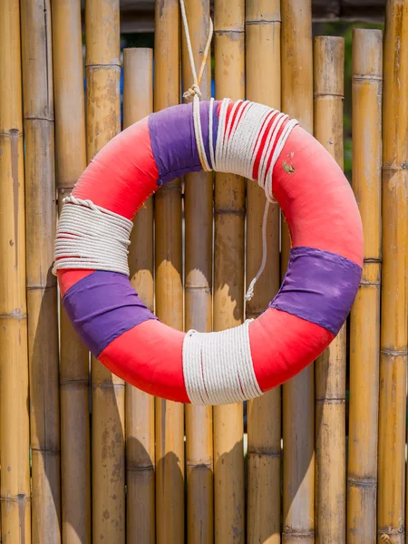 Lifering on bamboo backbround — Stock Photo, Image