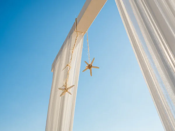 Strand huwelijksboog met Starfish — Stockfoto