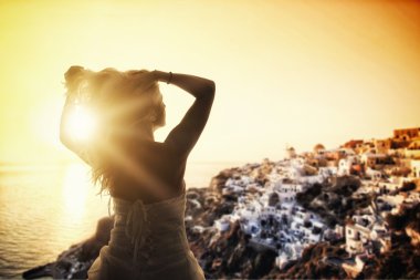 bride in white wedding dress at sunset in Santorini