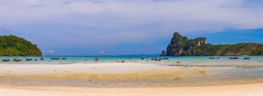 Beauty beach and limestone rocks in Phi Phi islands clipart