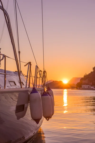 Sailing yacht at sunset — Stock Photo, Image