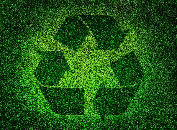 Genbrug symbol lavet af græs - Stock-foto