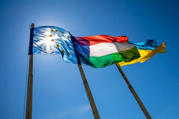 Flags Hungary Ukraine European Union Waving Pole Blue Sky — Stock Photo, Image