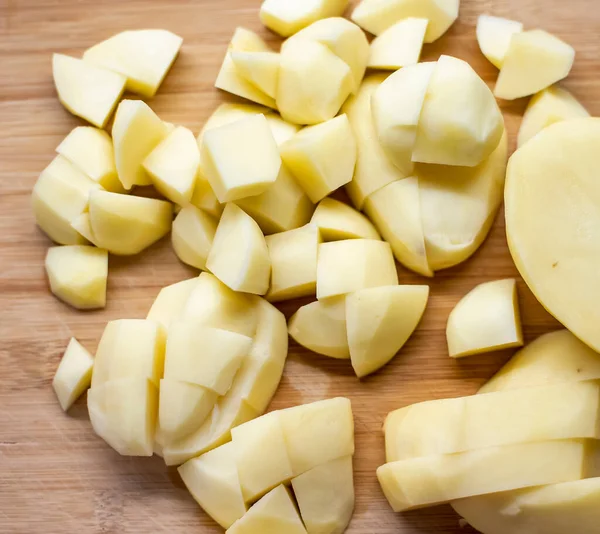 Chopped Uncooked Raw Potato Wooden Plate — Stock Photo, Image