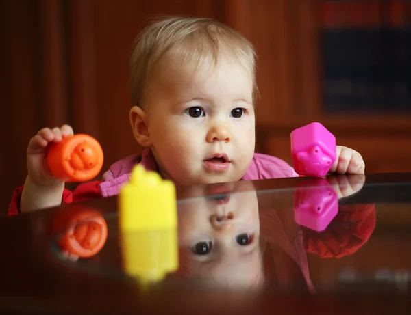 Portret van mooi schattig kind met speelgoed — Stockfoto