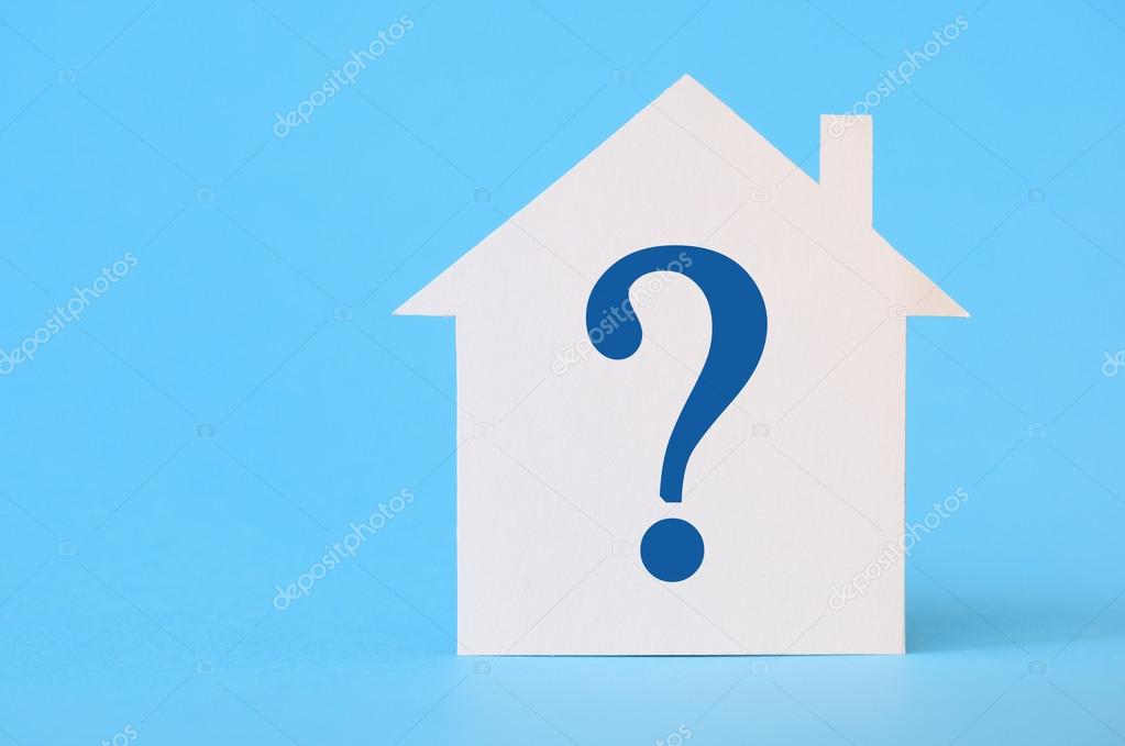 Paper house with question mark on blue background