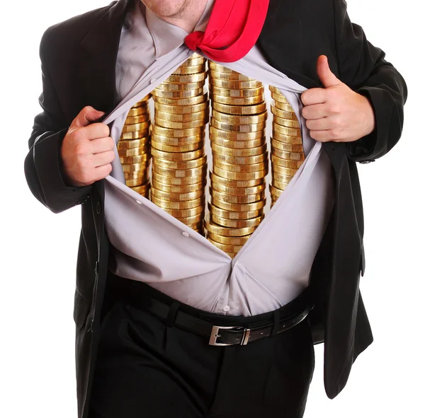 Businessman tearing his shirt piles coins on it — Stock Photo, Image