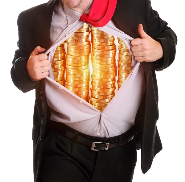 Businessman tearing his shirt piles coins on it — Stock Photo, Image