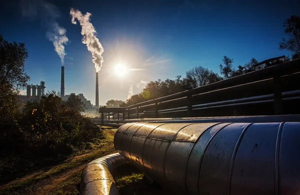 Power station with smoking chimney — Stock Photo, Image