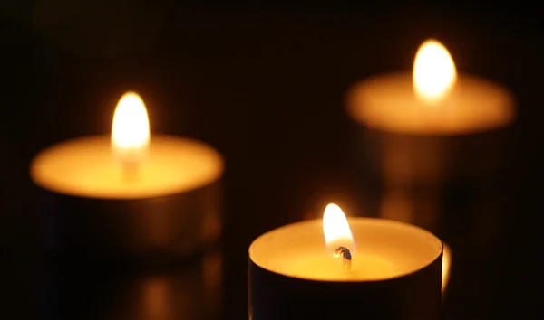 Three burning candles — Stock Photo, Image