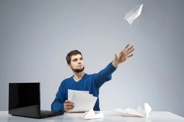 Young man bored at the office — Stock Photo, Image