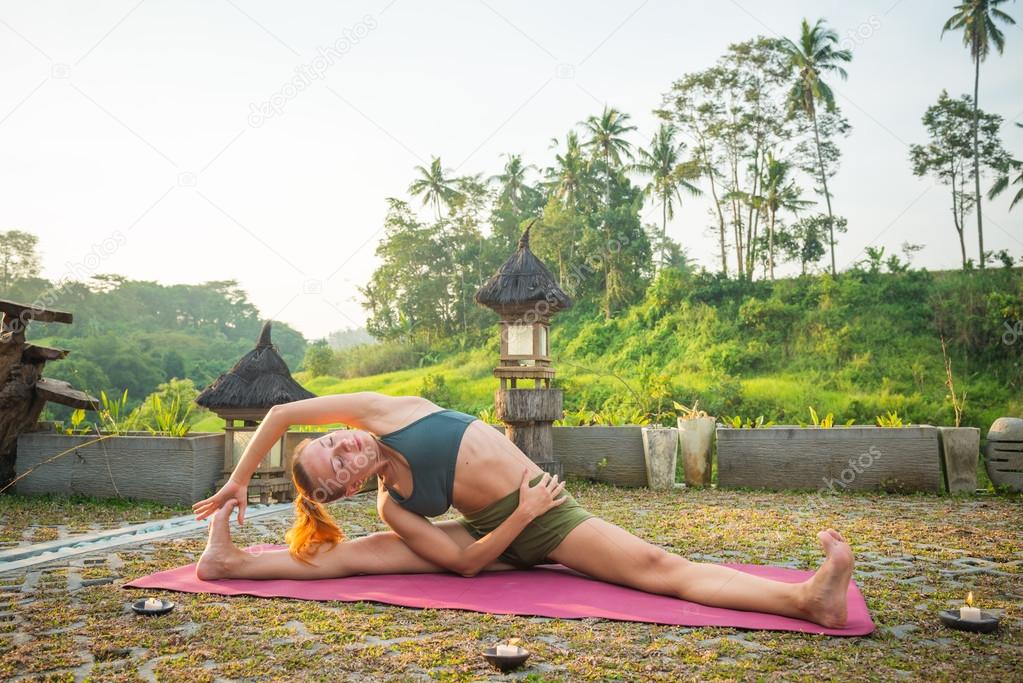 Young woman yoga stretching
