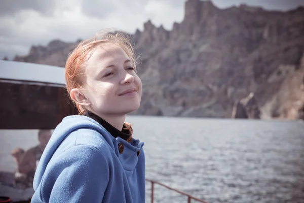 Young womn enjoying boat trip — Stock Photo, Image