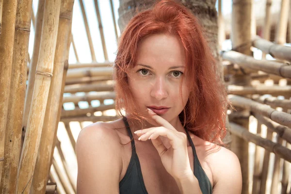 Beautiful young woman at the beach — Stock Photo, Image