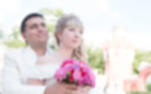 Wedding blur background with bride and groom — Stock Photo, Image