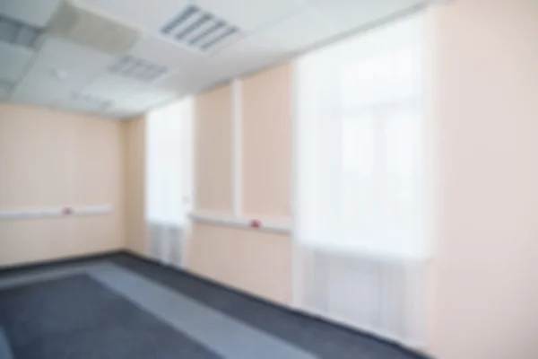 一般的なオフィスの建物の内部は、背景をぼかし — ストック写真