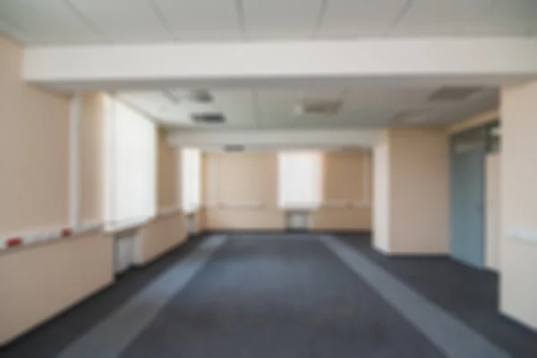 Gemeenschappelijke office gebouw interieur achtergrond wazig — Stockfoto