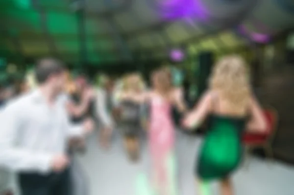 Mensen dansen wazig achtergrond — Stockfoto