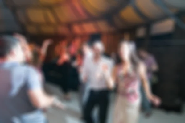 Gente bailando fondo borroso — Foto de Stock