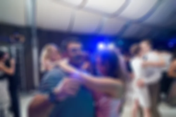 Lidé tančí rozostření pozadí — Stock fotografie